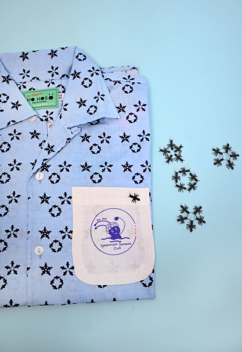 Camiseta abotonada "Club Natación Sincronizada" - Aguas Azules